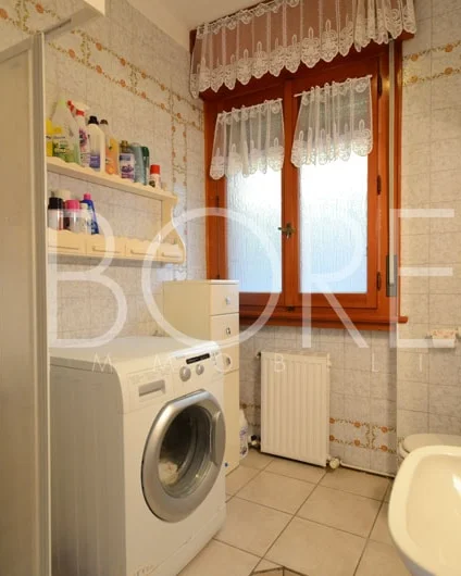 Baño con lavandería