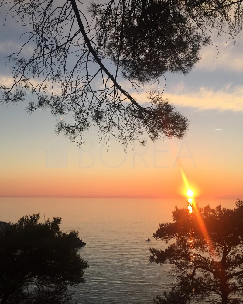 Puesta de sol sobre el golfo desde Grignano